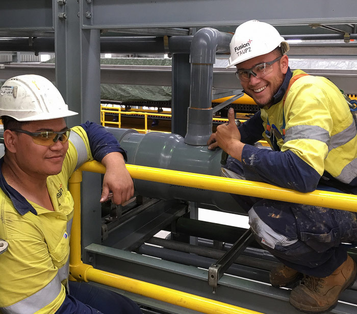 Fusion Brisbane Staff Inspecting Pipework