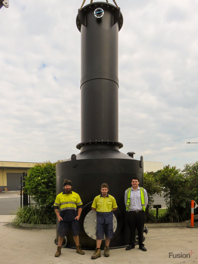 A Fusion engineer and plastic fabricators who were involved in this degassing tower project
