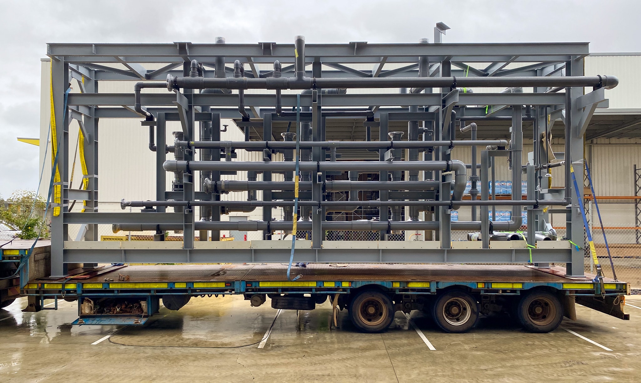 CPVC spools installed on steel frame for delivery