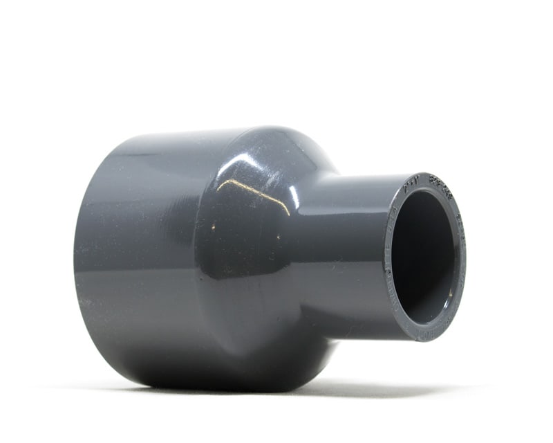 product photo of a UPVC Schedule 80 reducing socket on a white background